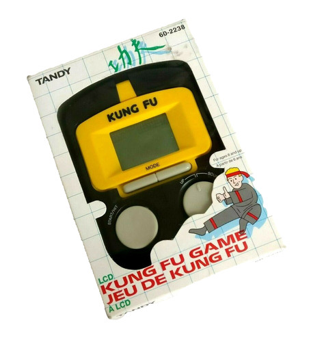 Tandy kung handheld - tandy,