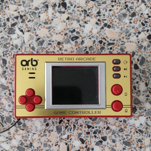 Orb vintage handheld game - -,